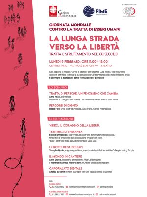 Uomo seduto davanti alla bandiera della R.D. Congo