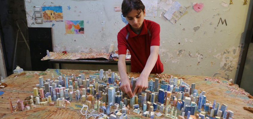 Il ragazzo che ricostruisce Aleppo